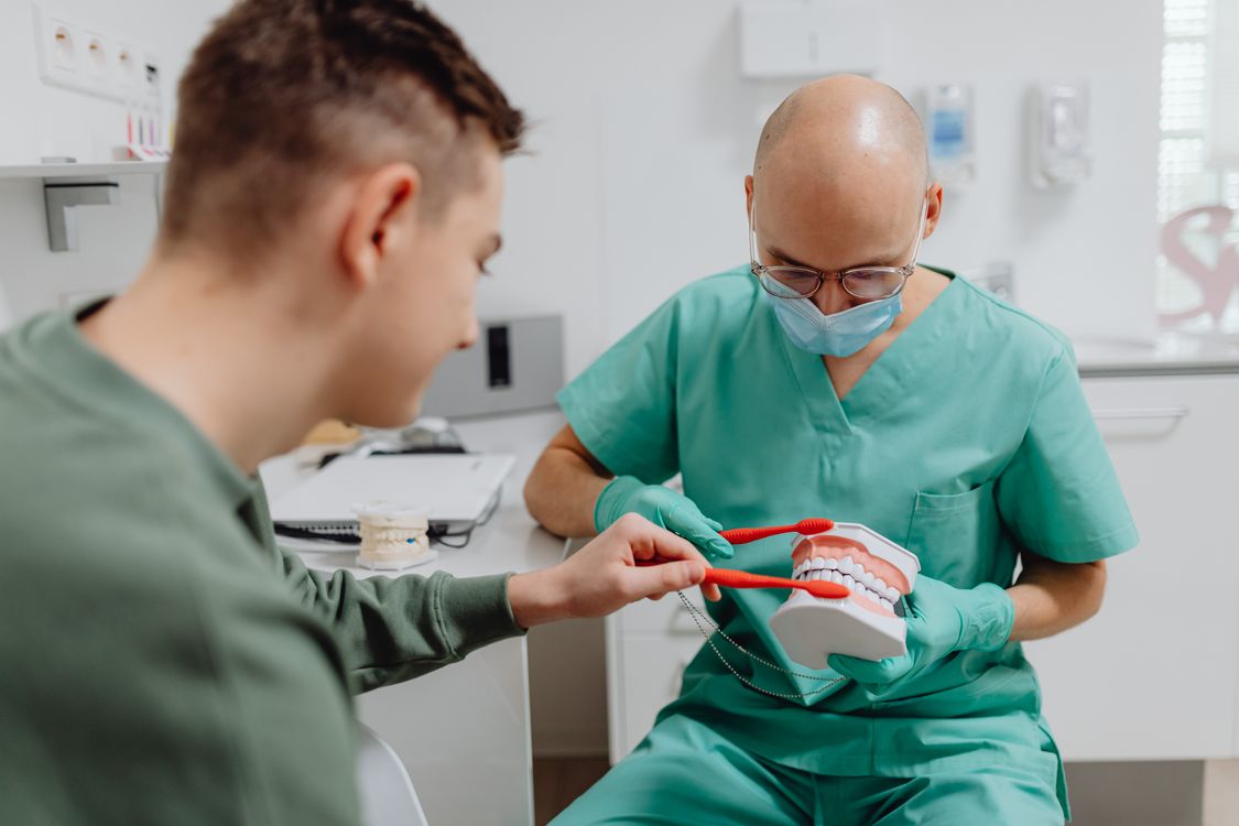 Dental implant recovery consultation at a dental clinic in Aurora