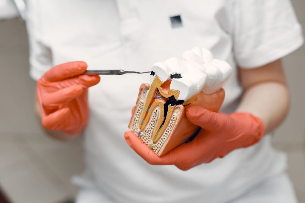Dentist explaining root canal treatment to a patient in Aurora